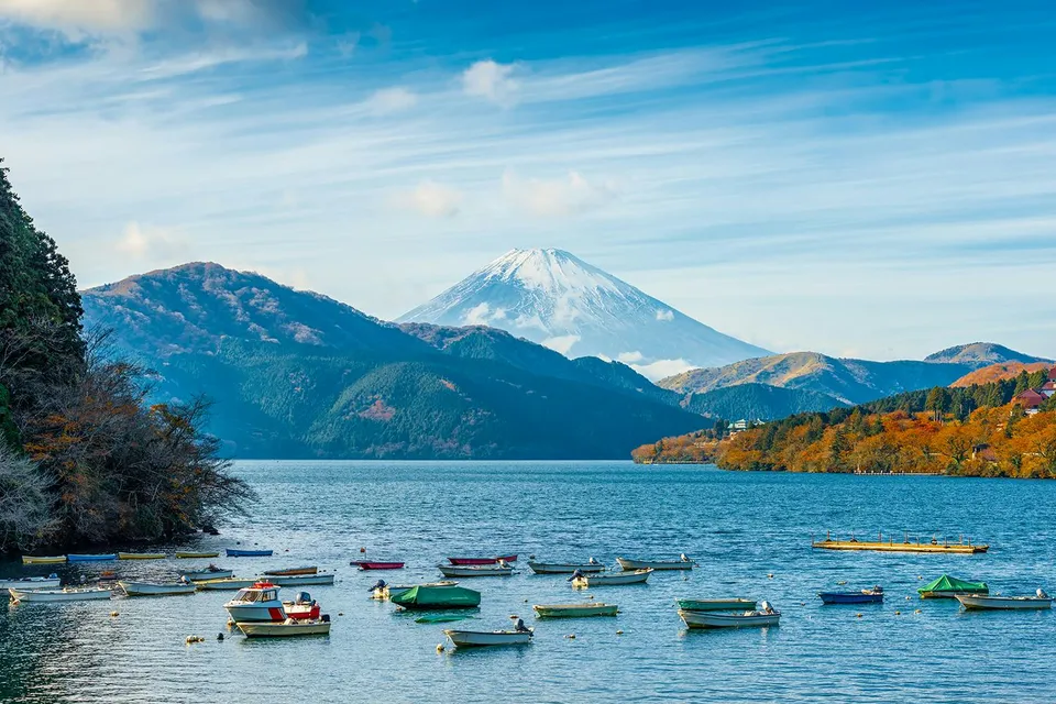 Boats on Lake Ashi with Mt. Fuji in the background, Japan.