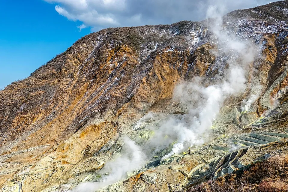 Volcanic steam vents at Owakudani Valley on Mt Fuji tour from Tokyo.
