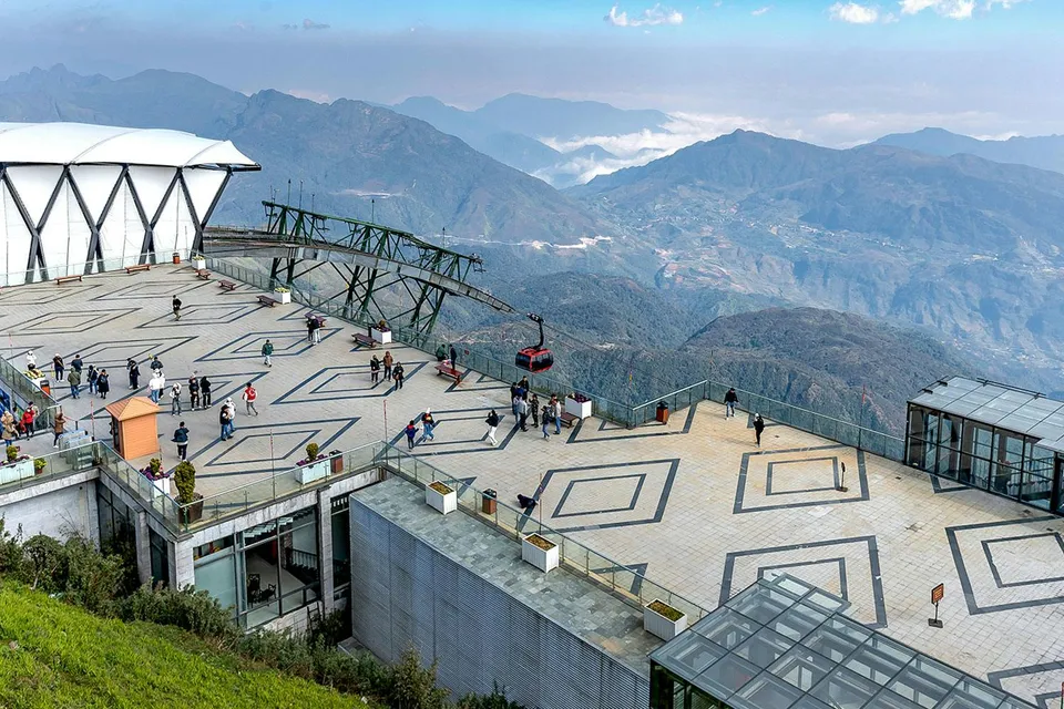 Cable car station at Sun World Fansipan Legend with mountain views in Vietnam.