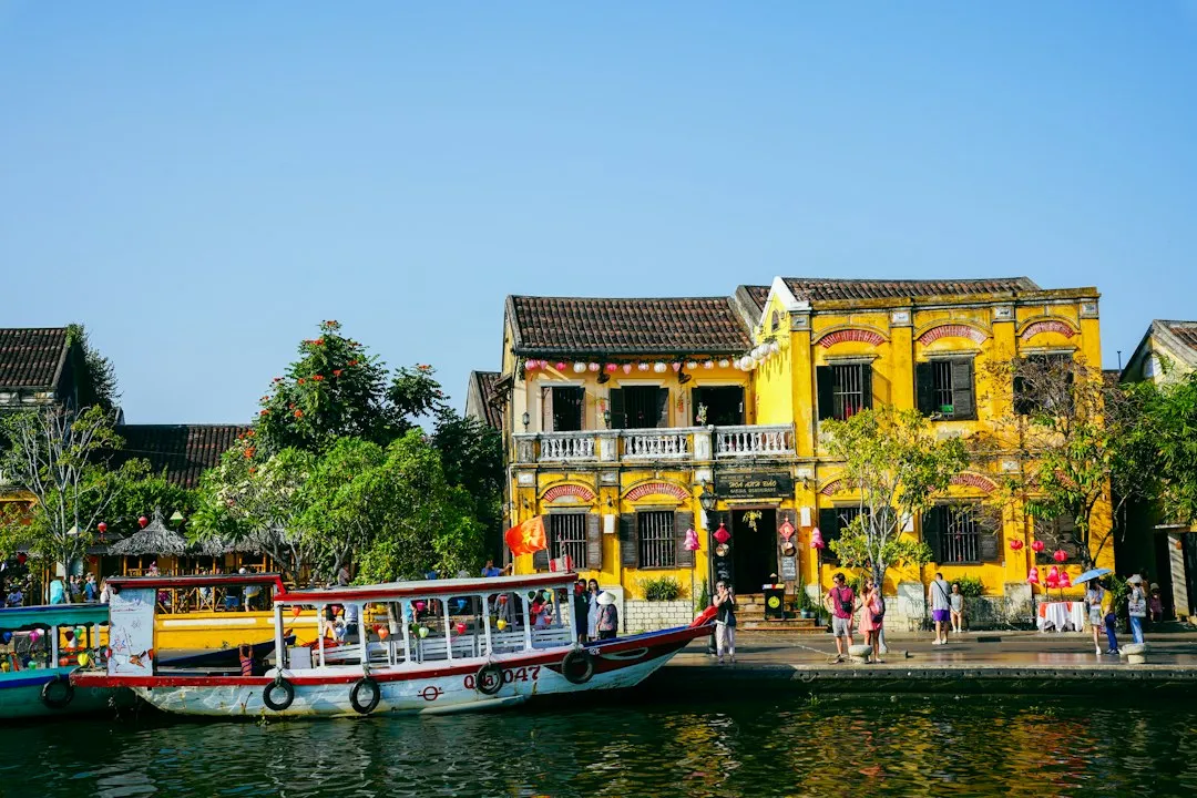 A group of boats that are sitting in the water