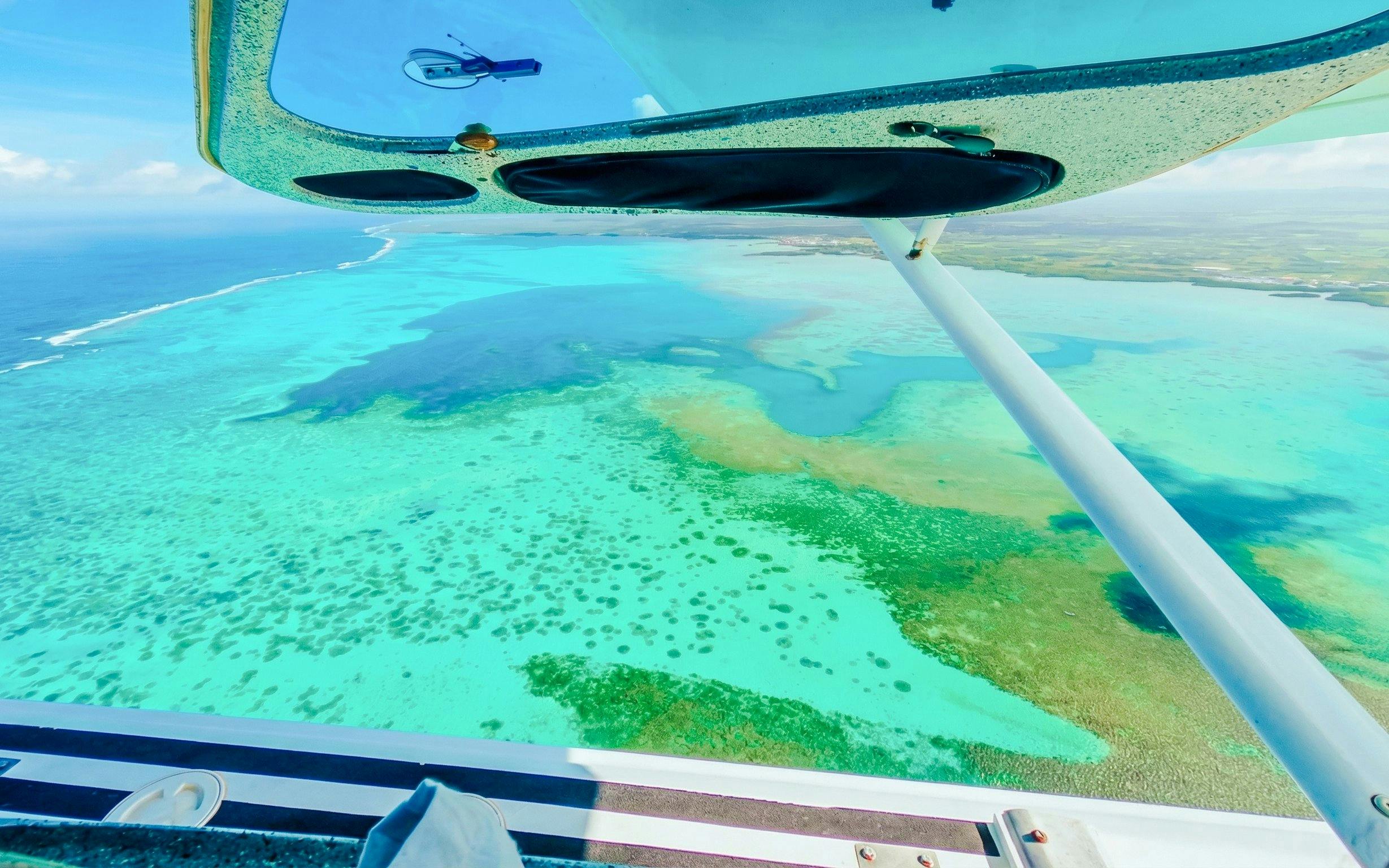 Aerial view of the Eastern Underwater Waterfall from a seaplane, Mauritius.