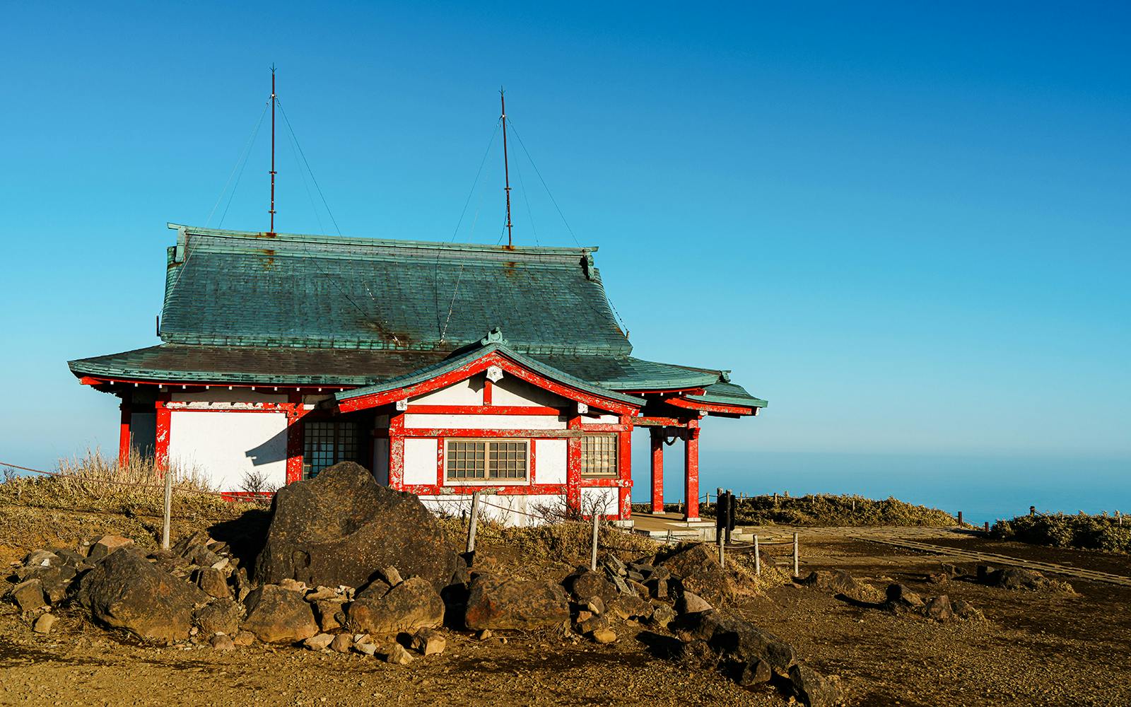 Hakone Mototsumiya Shrine on Mount Komagatake Summit with clear blue sky.
