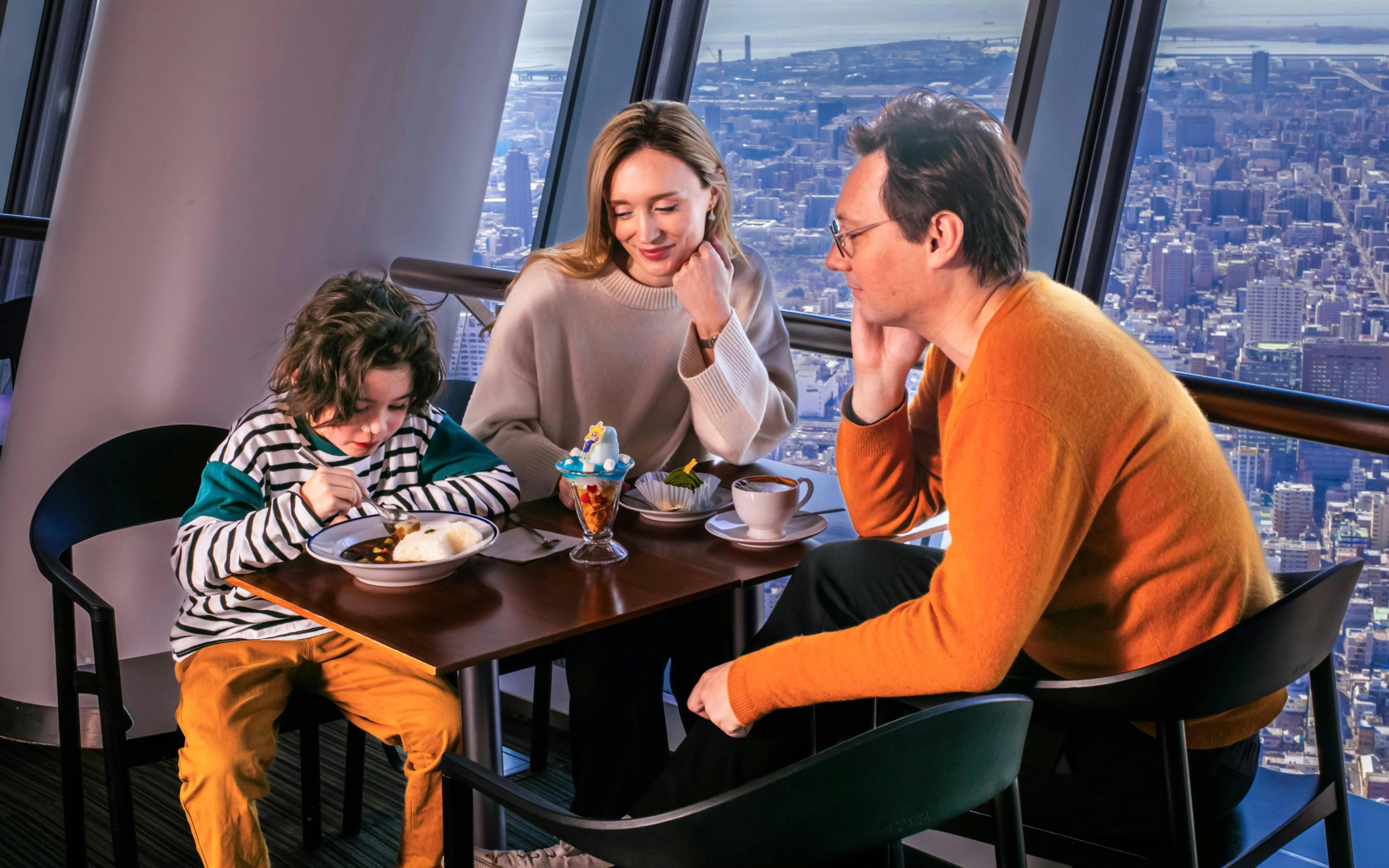 Family dining with city view at Tokyo Skytree.