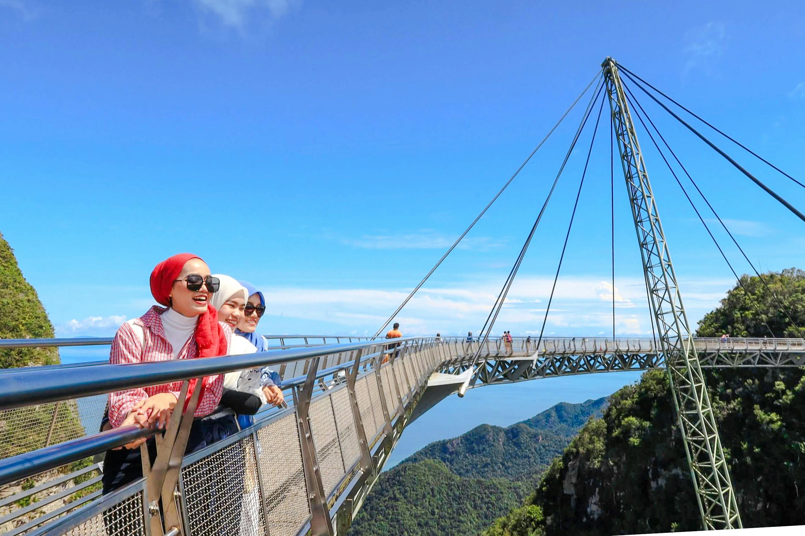 Women enjoying the view from Langkawi Skybridge, Malaysia.