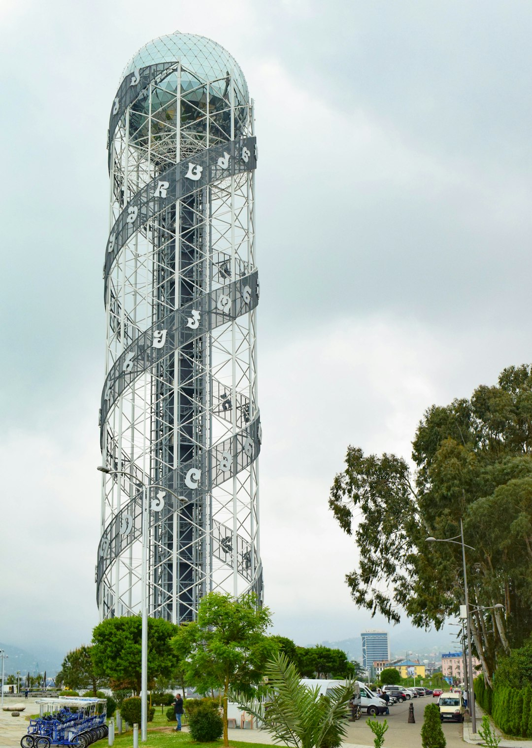 a tall tower with a clock on the side of it