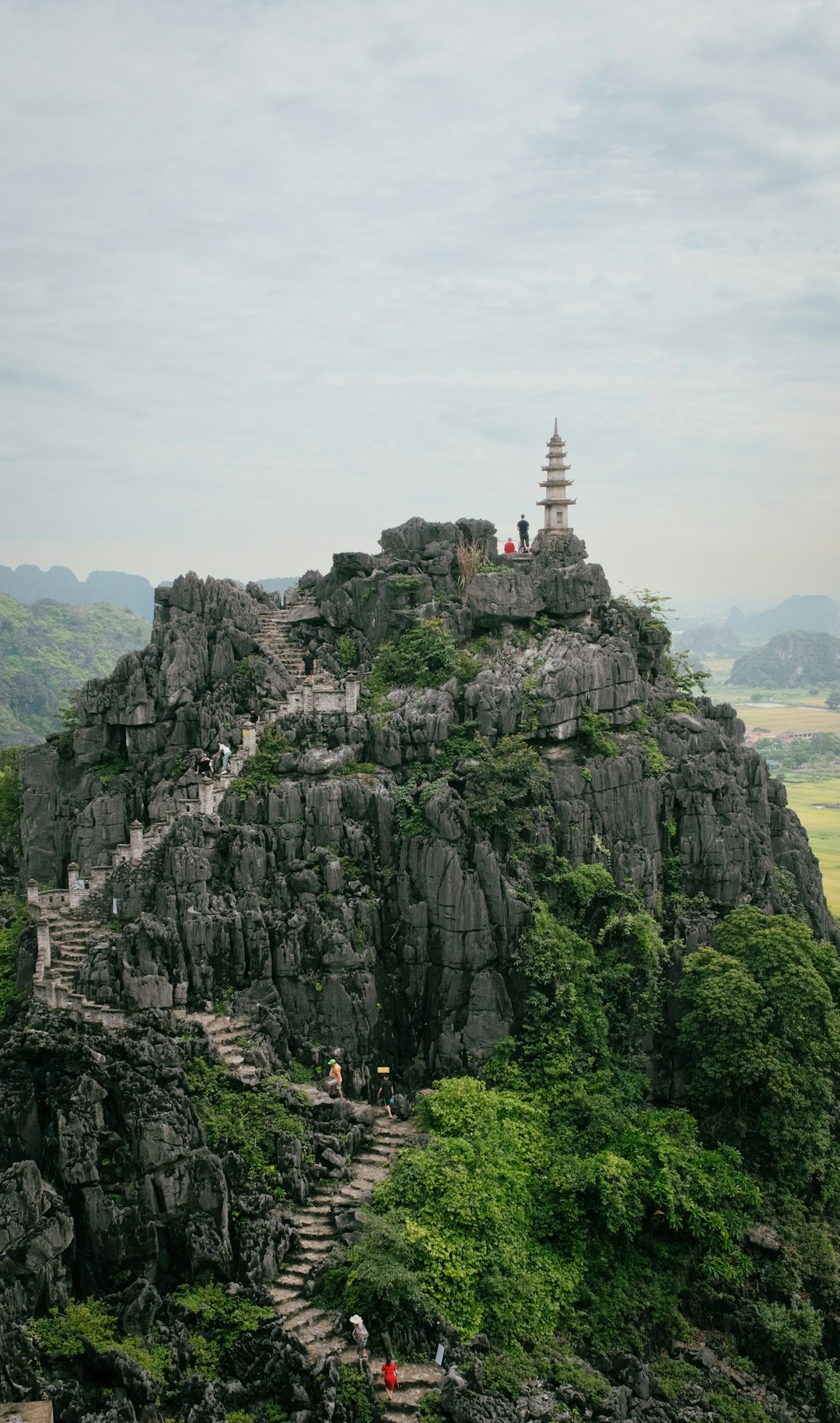 Climbing a mountain to a pagoda's peak